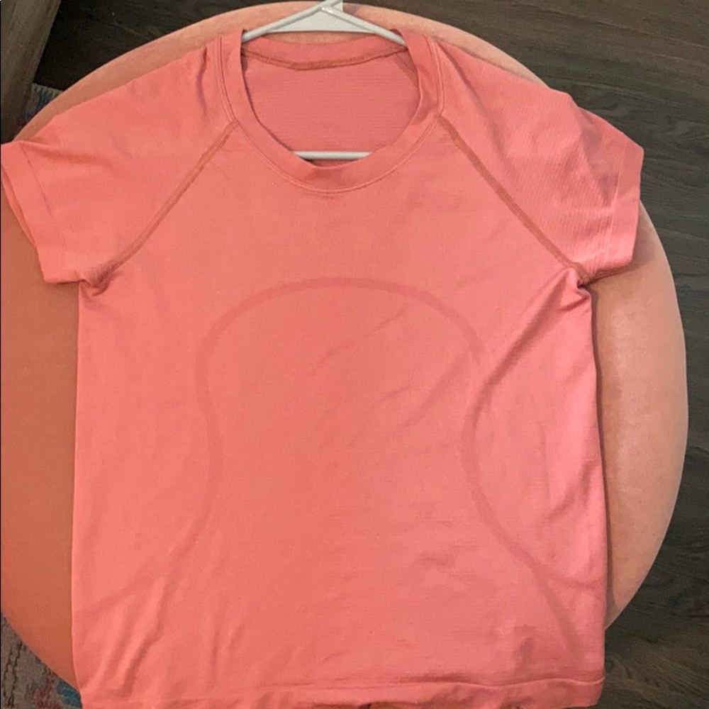 Pink lululemon shirt, has stain